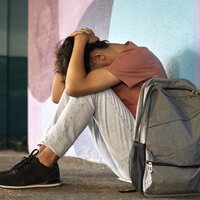 sad_boy_sitting_on_ground